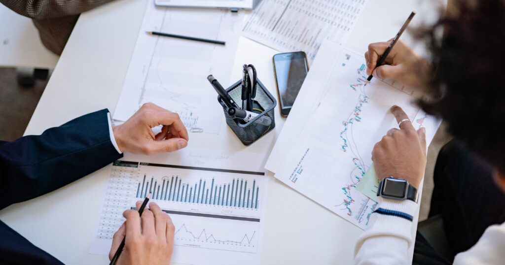 Reviewing charts before deciding to outsource IT.